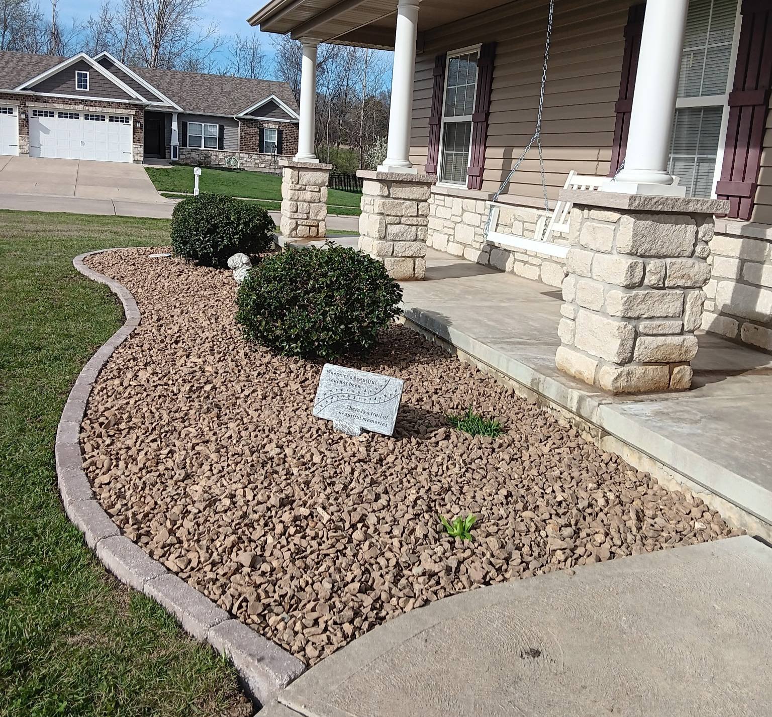 landscape bed with rocks and edgers in st louis